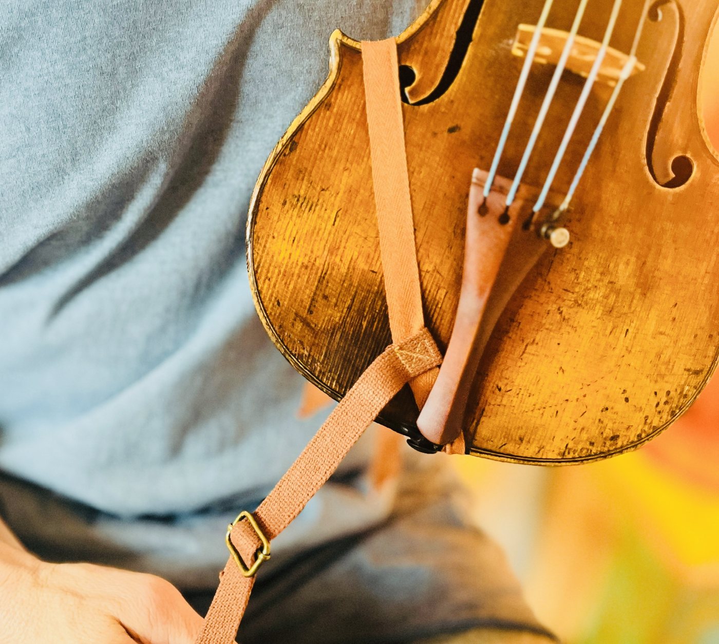 Fiddle Ease strap running across the violin body